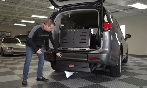 Folding access system for rear-entry wheelchair conversion vans